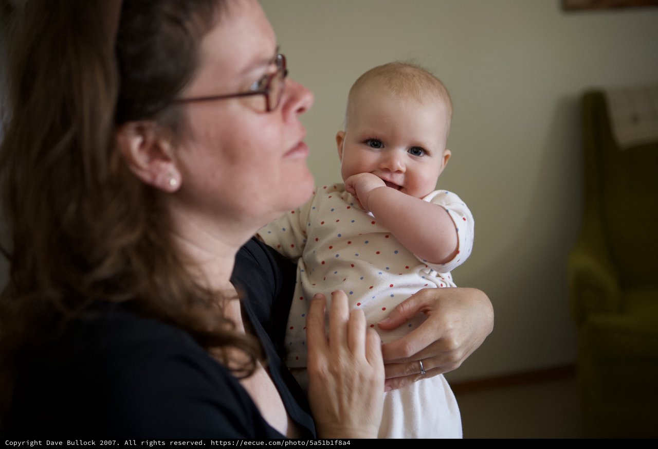 Mother and Baby Share a Tender Indoor Moment