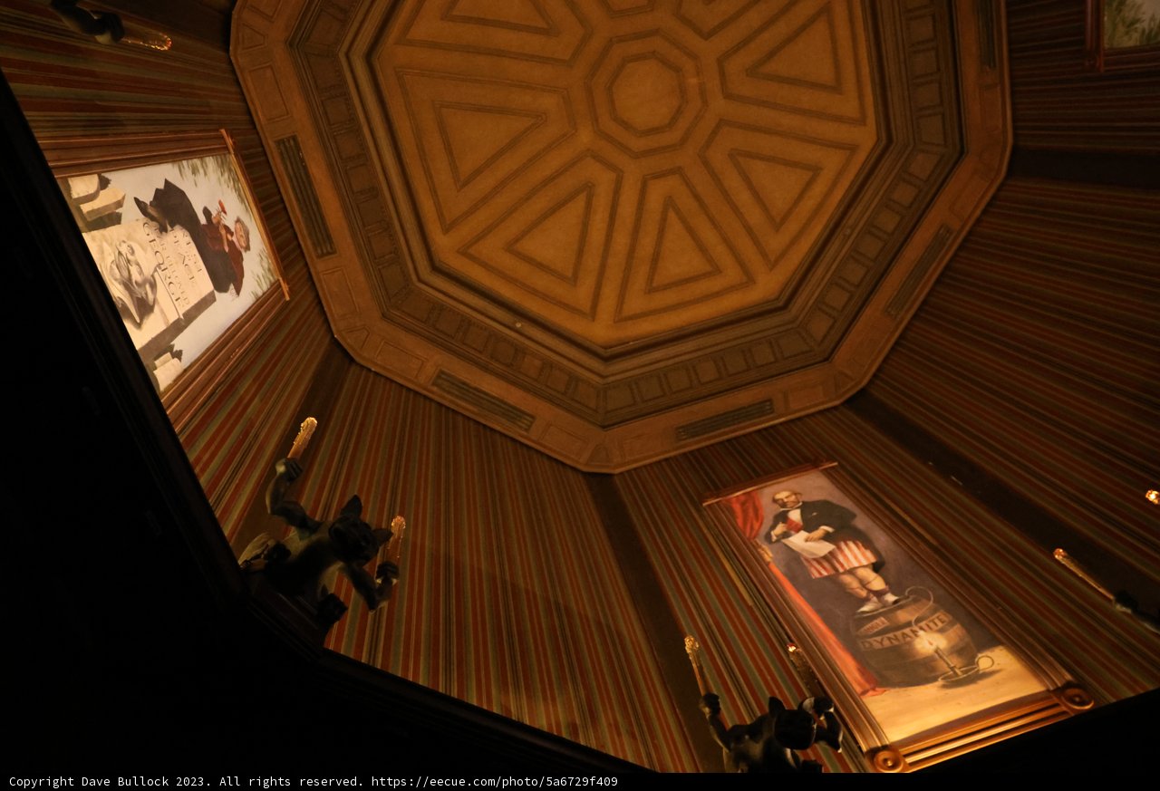 Intricate Ceiling Paintings in a Captivating Space
