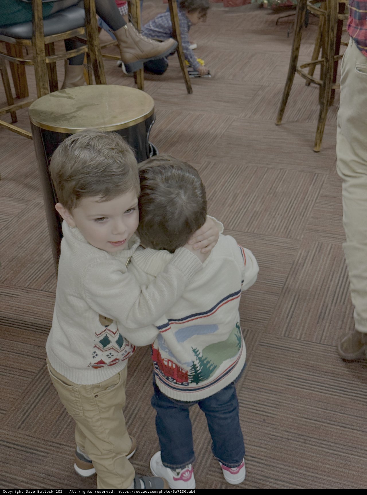 Two Young Boys Share Sweet Embrace
