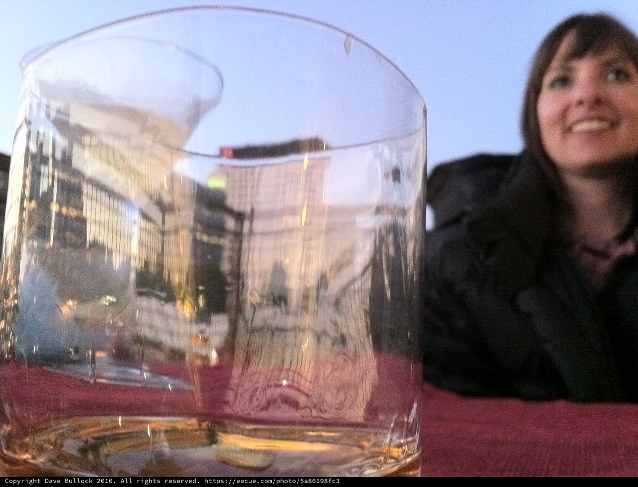 Empty Glass Reflections at a European Outdoor Café