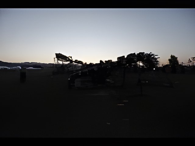 Desert Sunset with Massive Structure