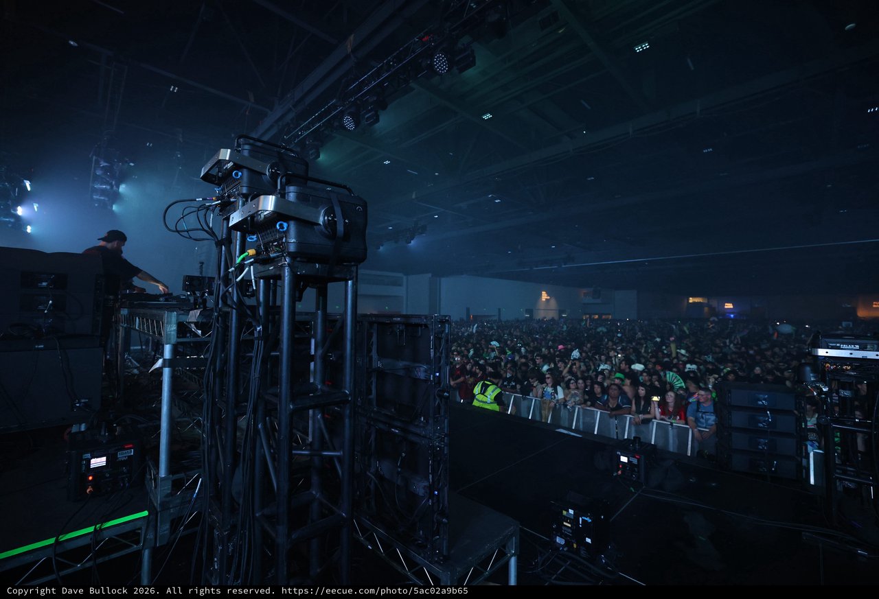 DJ Performs Before Massive Indoor Festival Crowd