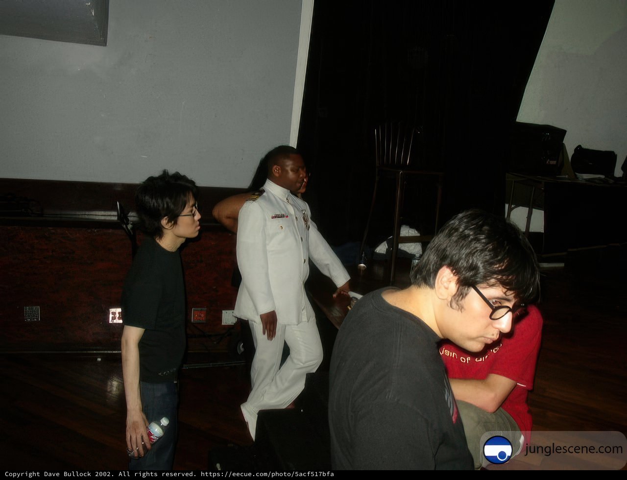 Group Portrait with White Shirt Man