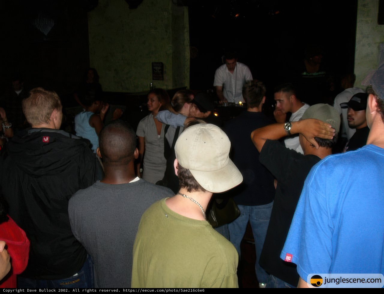 Man in Baseball Cap Draws Crowd