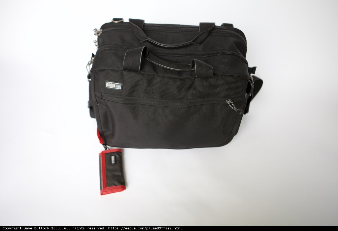Sleek Black Backpack with Striking Red Straps