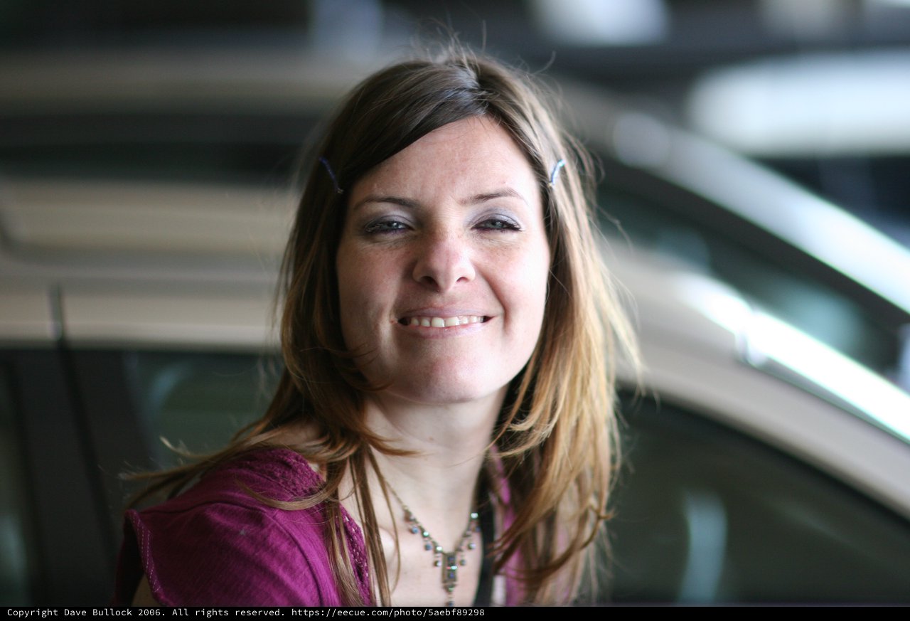 Smiling Woman Portrait Near Car in Tokyo