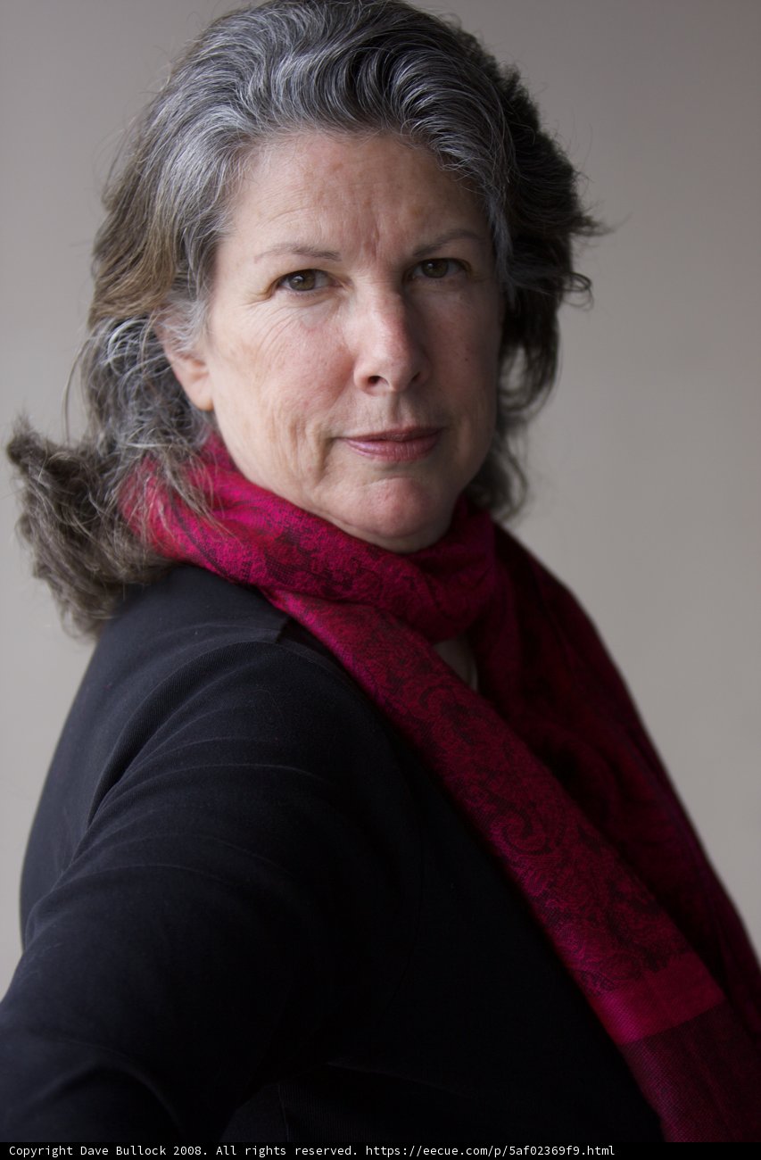 Rhoda B in Her Signature Red Scarf