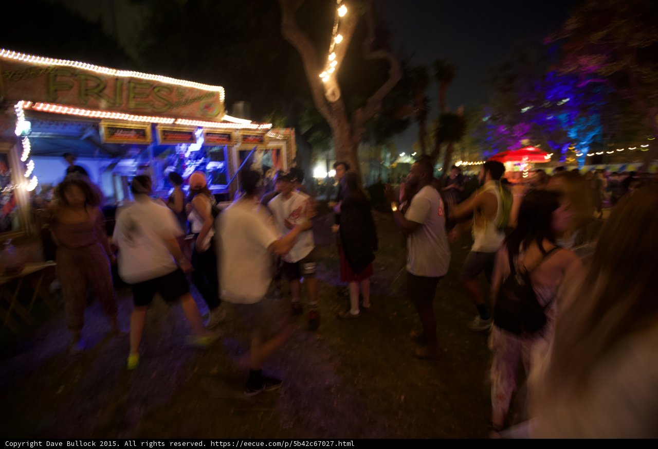 FYF Fest Festival Grounds Poutine Fries Food Vendor String Lights Night Motion Blur