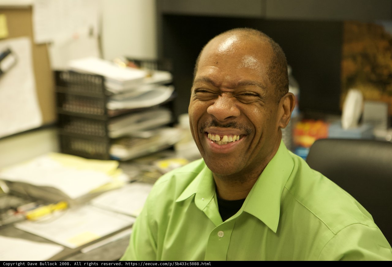 Happy Black Man at His Desk