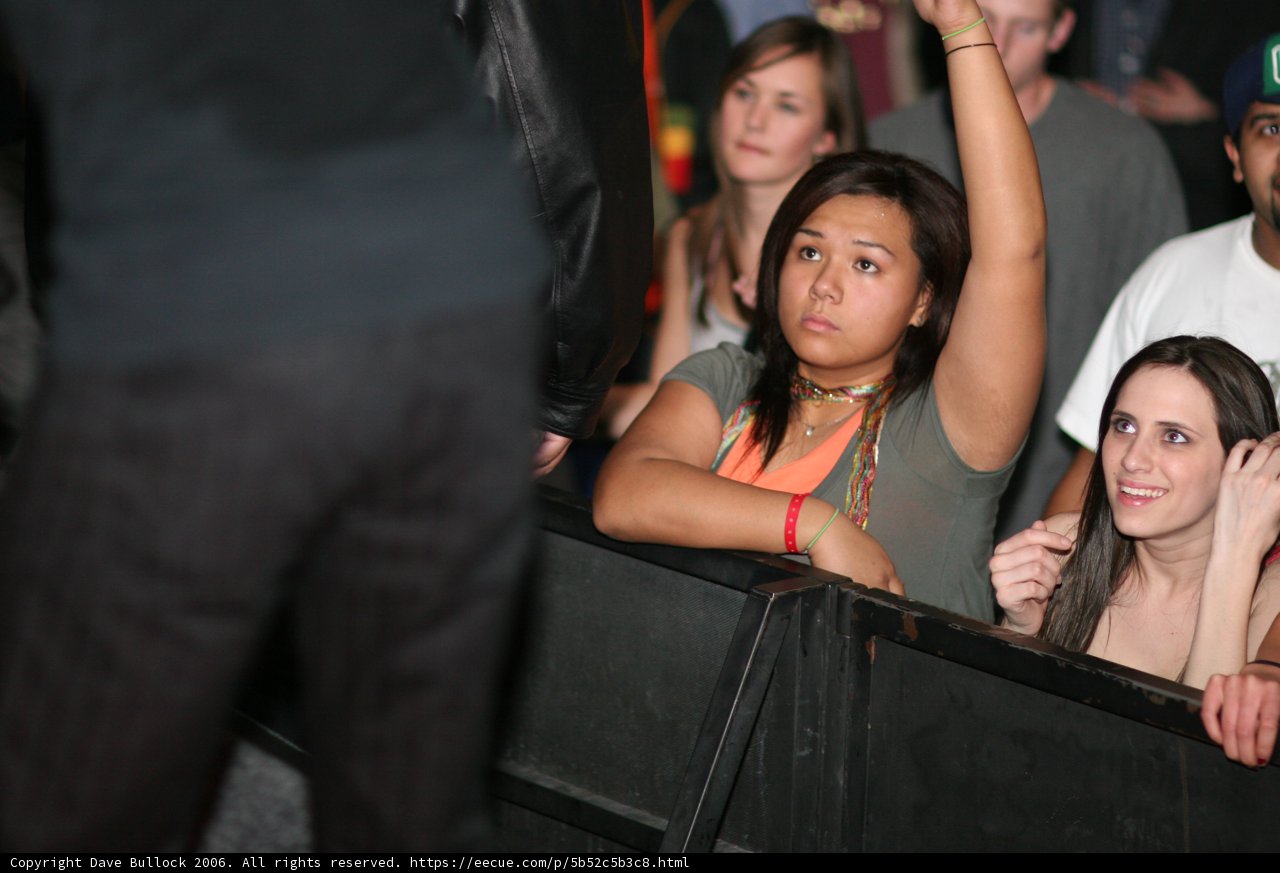 Club-goer Raises Hand in the Night