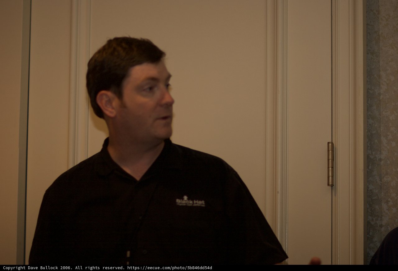 Black Shirted Man by the Sliding Door