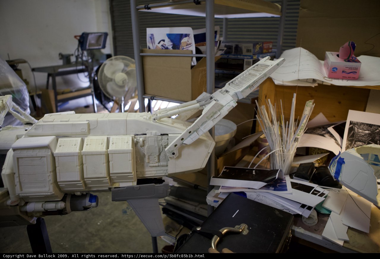 Spaceship Model on Plywood Table