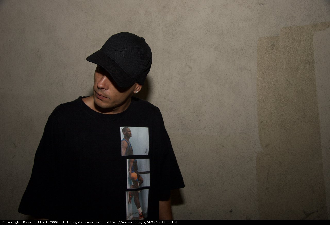 Dj S Sports a Cool Hat and T-Shirt Combo