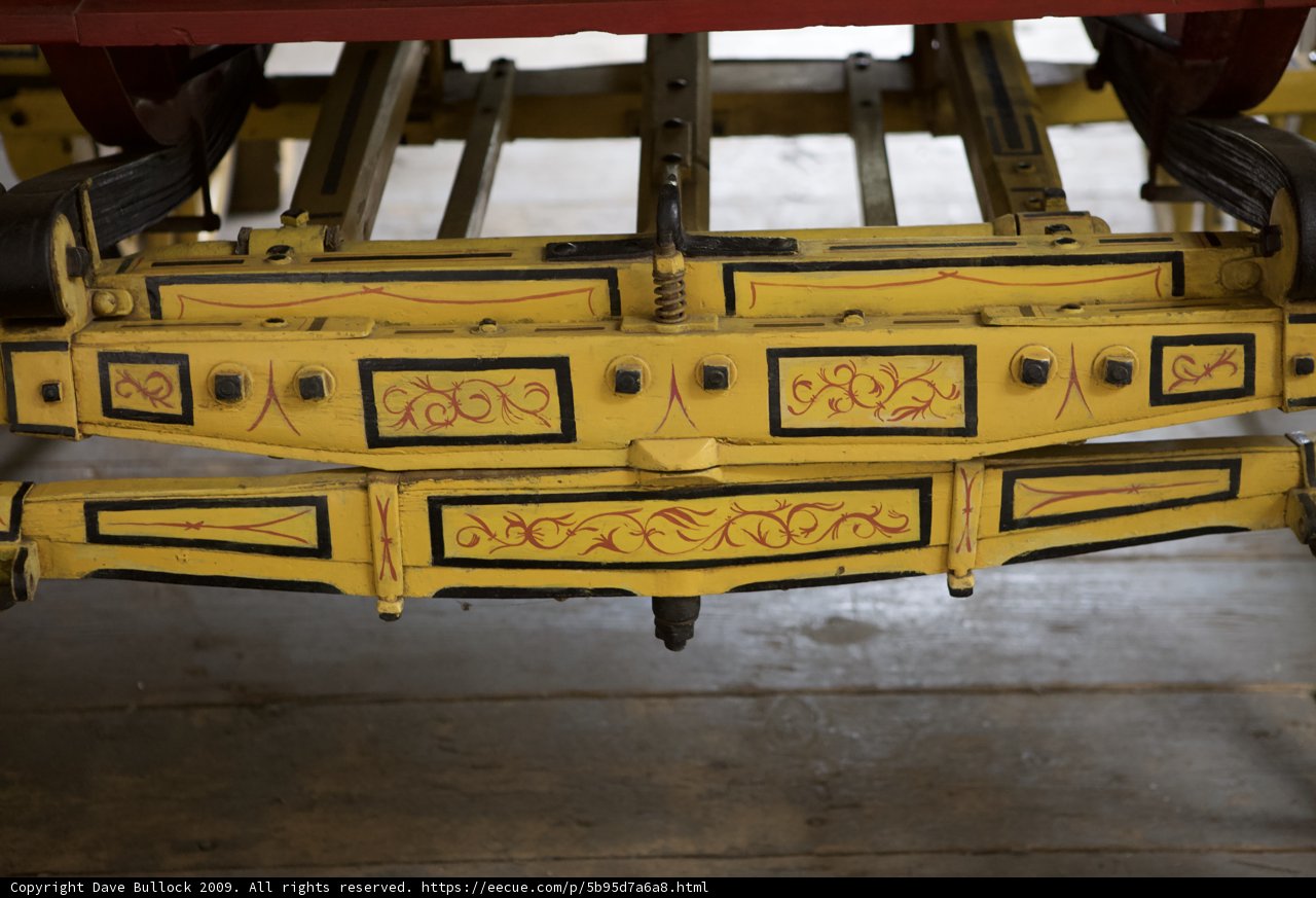Yellow Wagon with Black and Red Designs