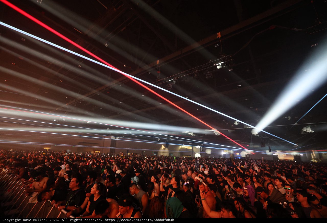 Laser Light Storm Over Massive Festival Crowd