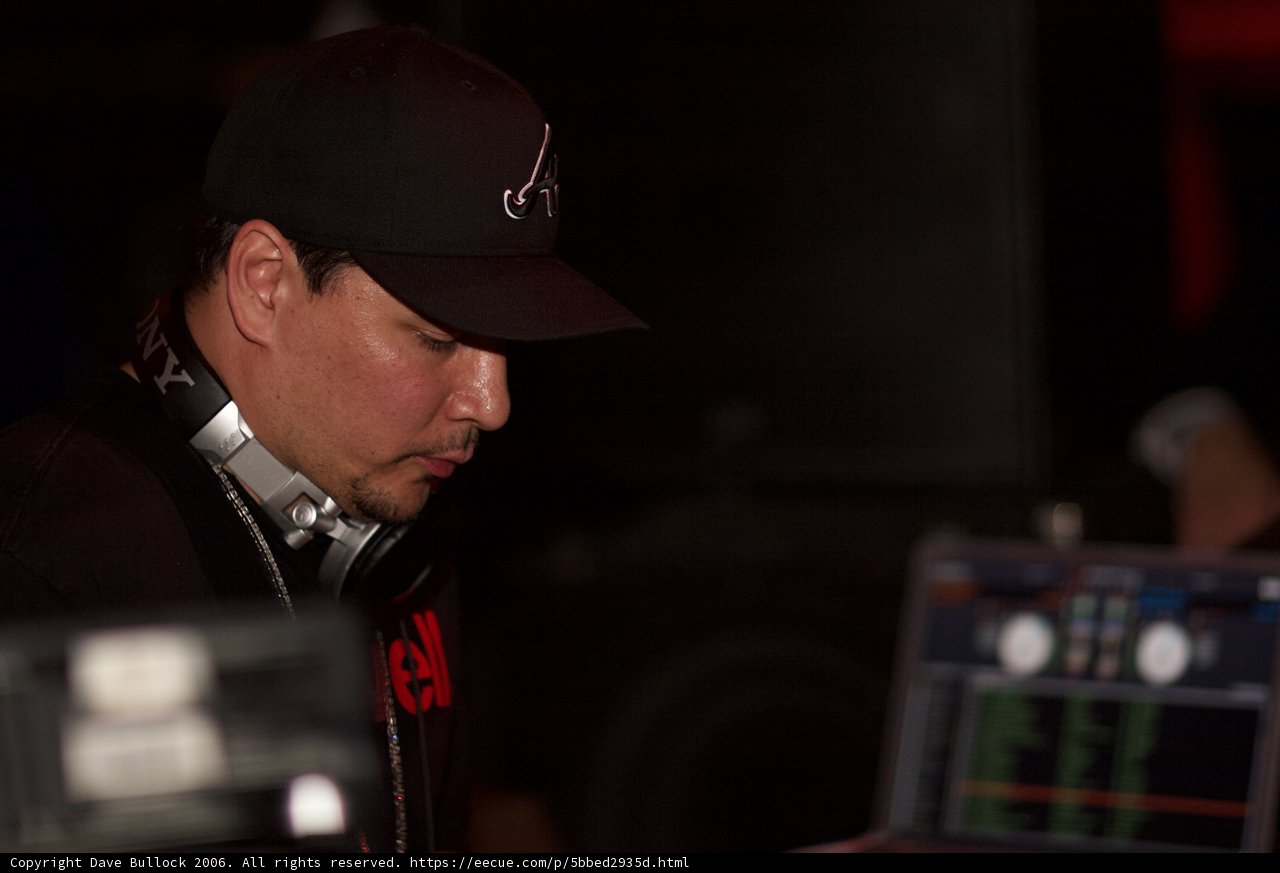 Entertainer in Baseball Cap and Headphones