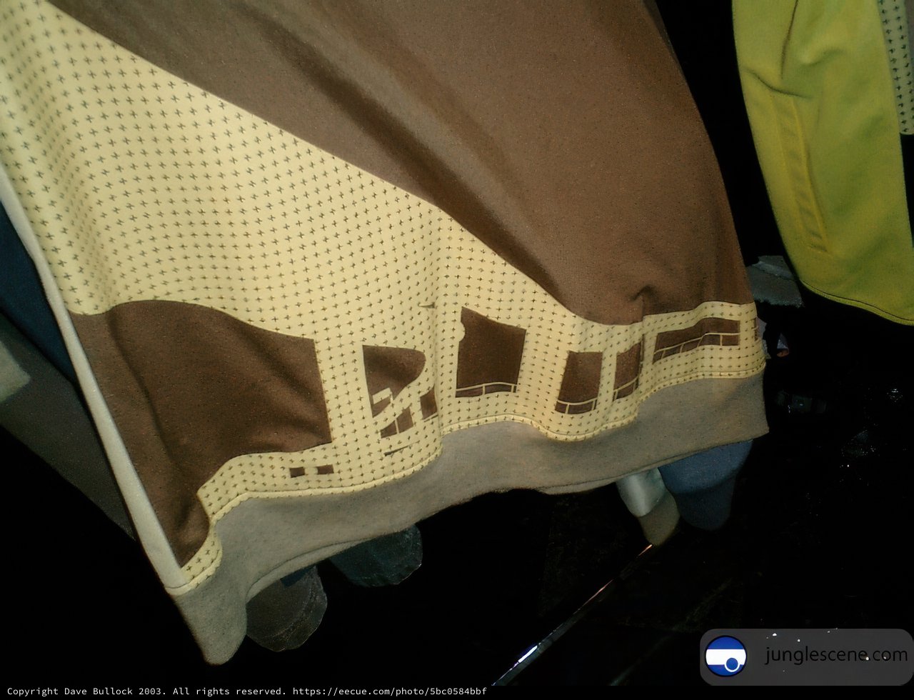 Brown and White Shirt on Display