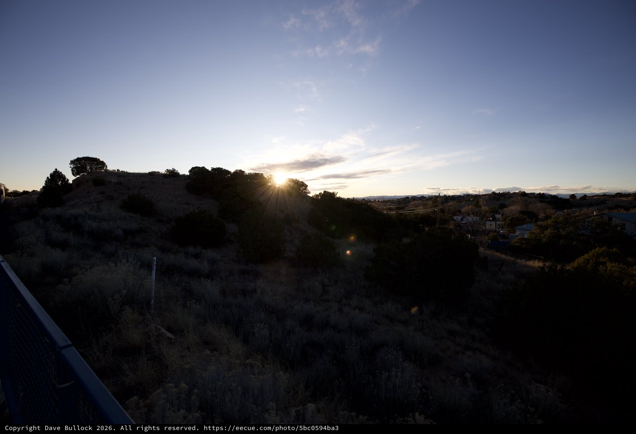 Sunset Over Rolling Hills and Rural Valley