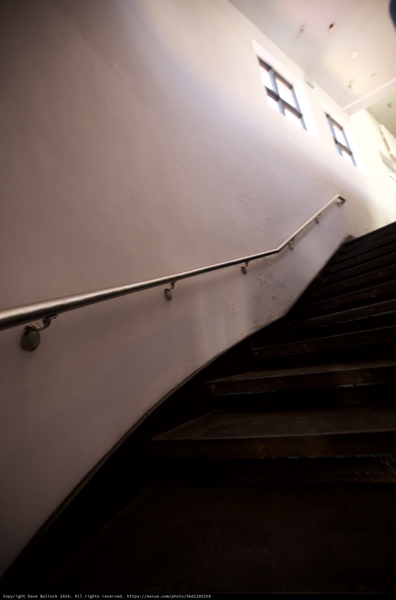 Ascending the Shadows: Minimalist Stairwell Perspective