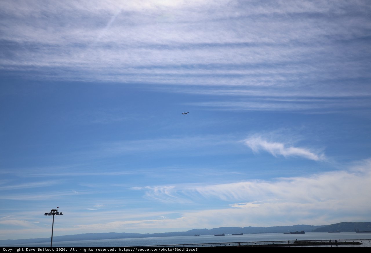 Aircraft Departing Over Bay at Dusk from USS Hornet