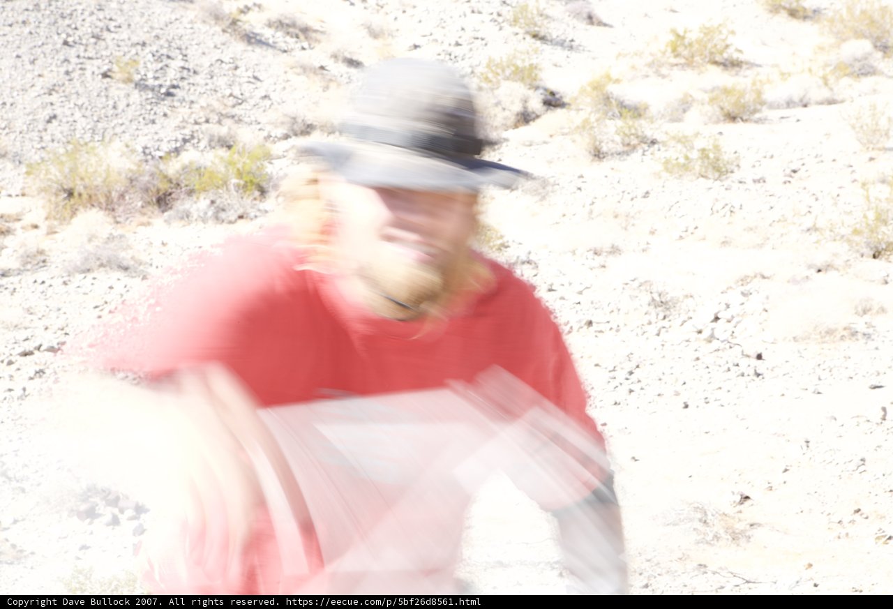 The Red Shirted Man and his Sun Hat