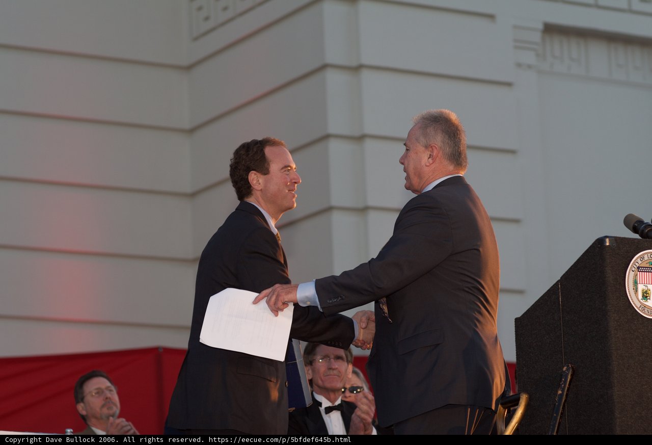Formal Handshake at a Podium