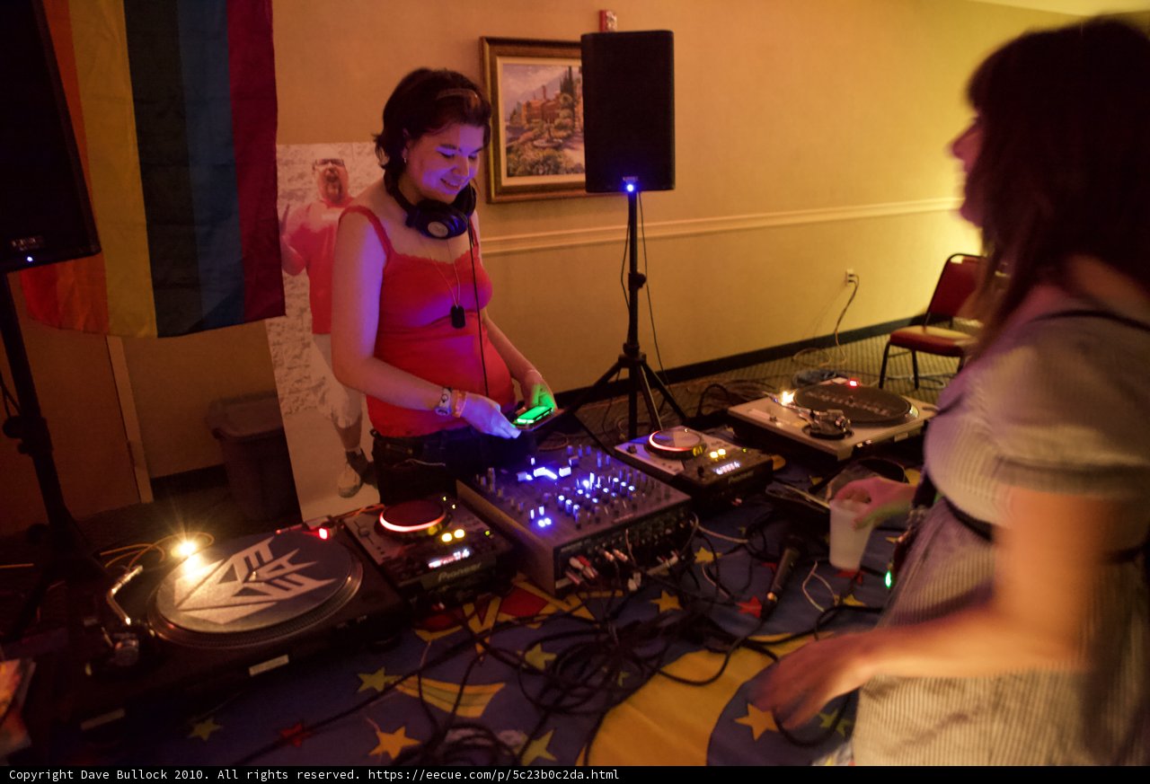 Women and DJ playing music