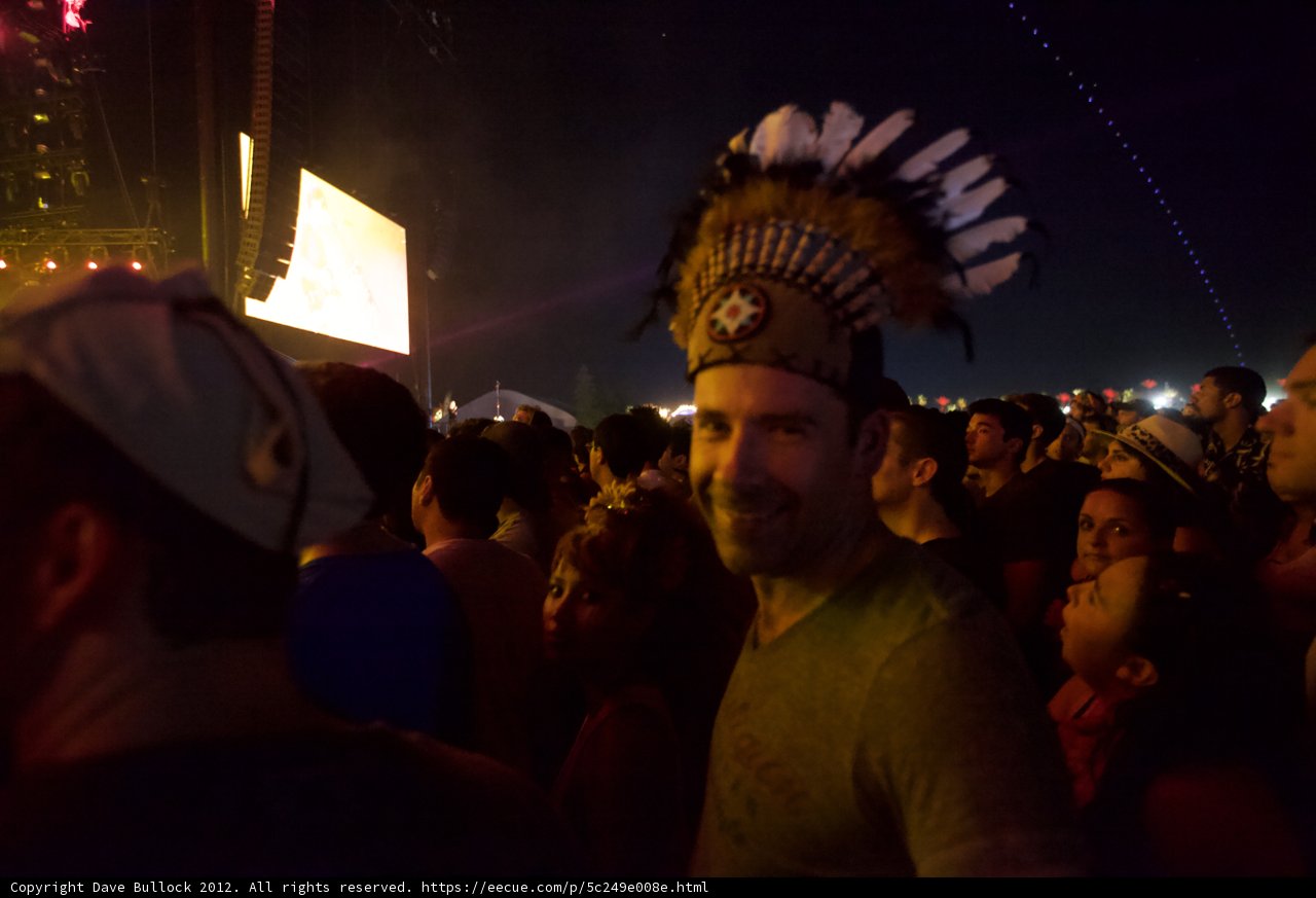 Man in Indian Headdress Stands Out in Coachella Crowd