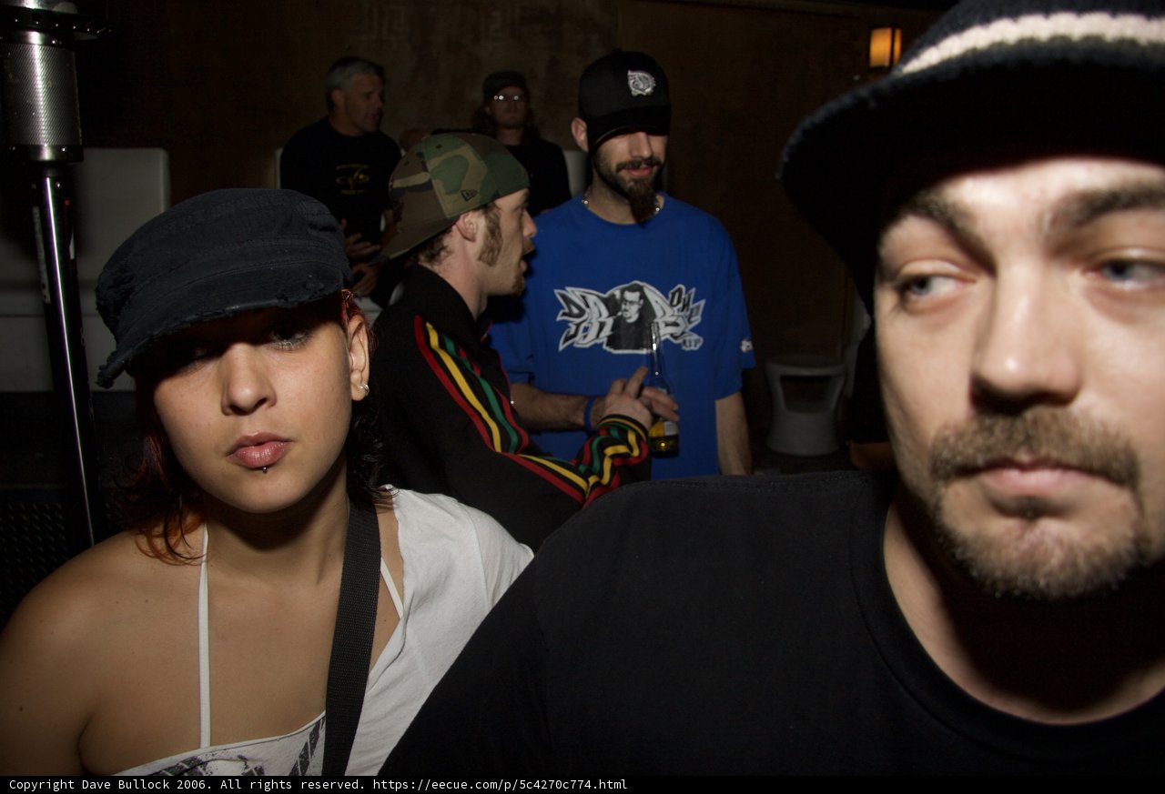 Partygoers Sporting Baseball Caps