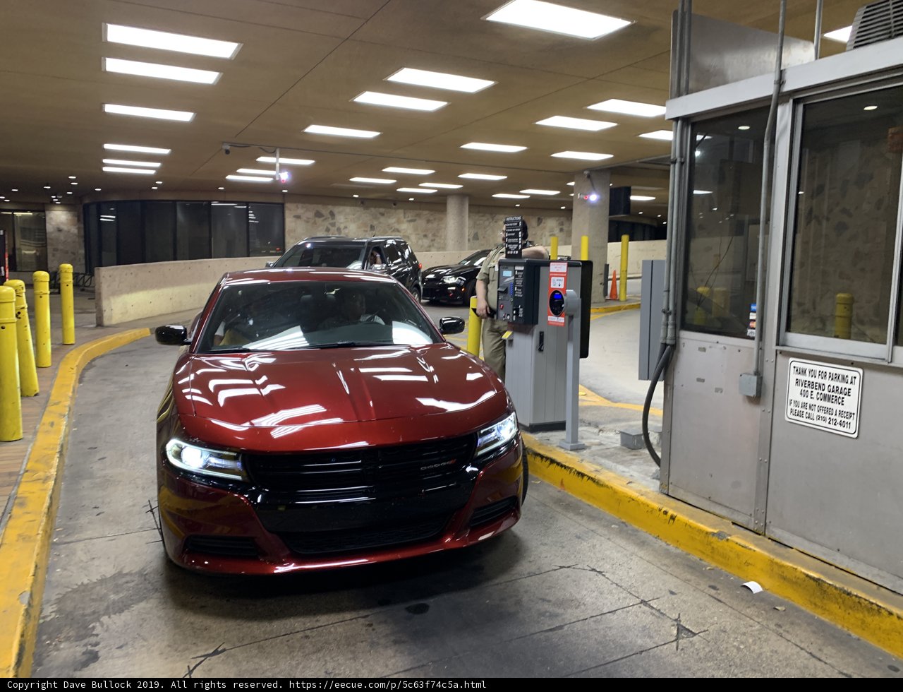 Red Sports Car in Parking Garage