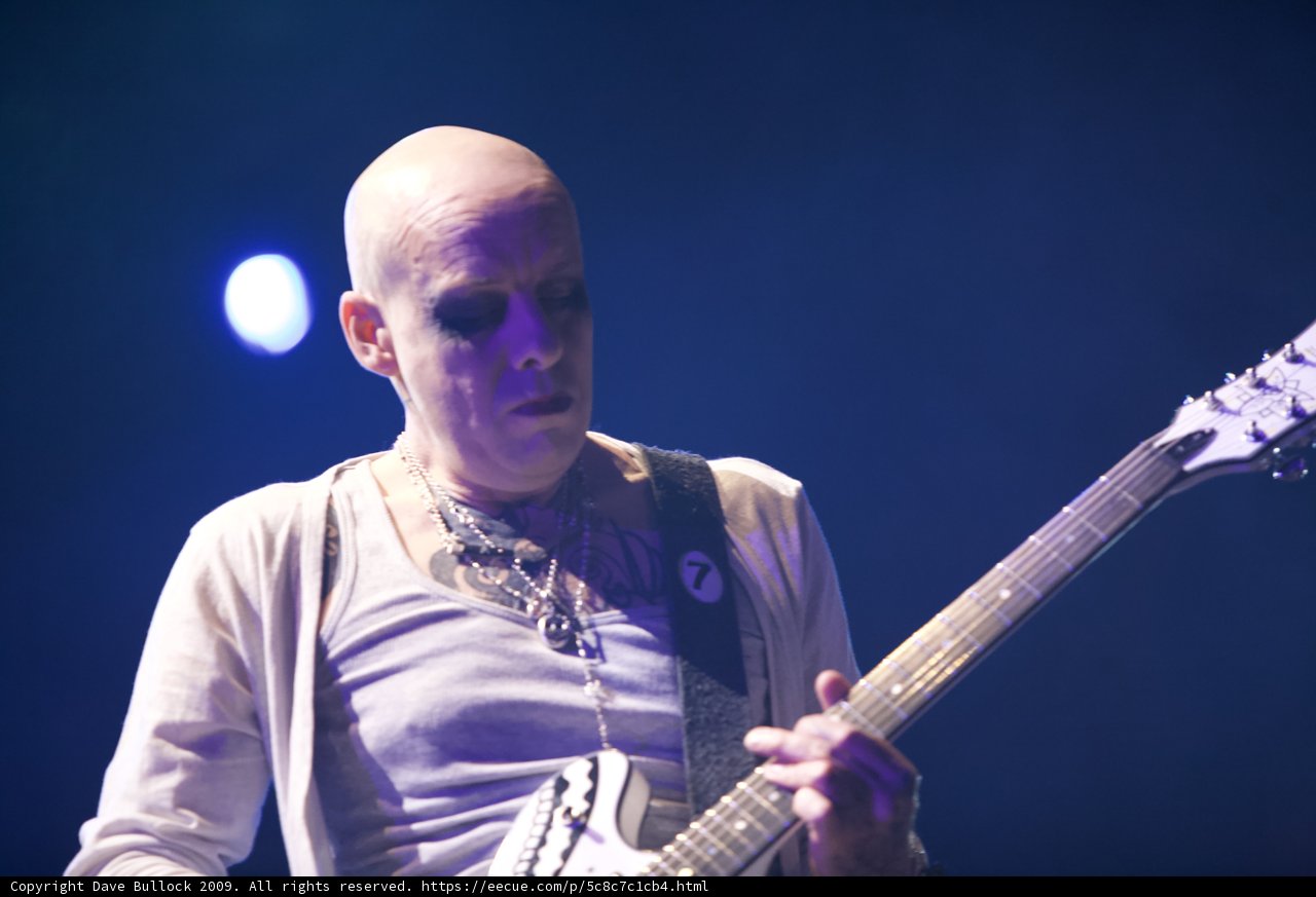 Bald Man Rocks Coachella Stage with Epic Guitar Skills