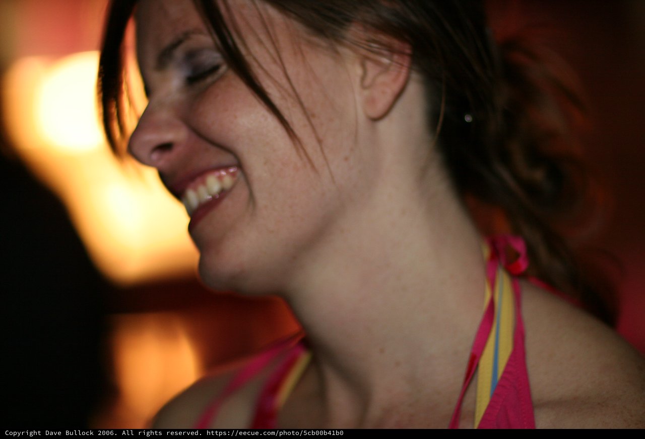 Joyful Woman Laughing in Warm Evening Light