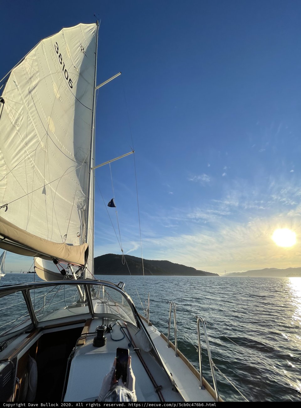 Serene Sailboat Sunset