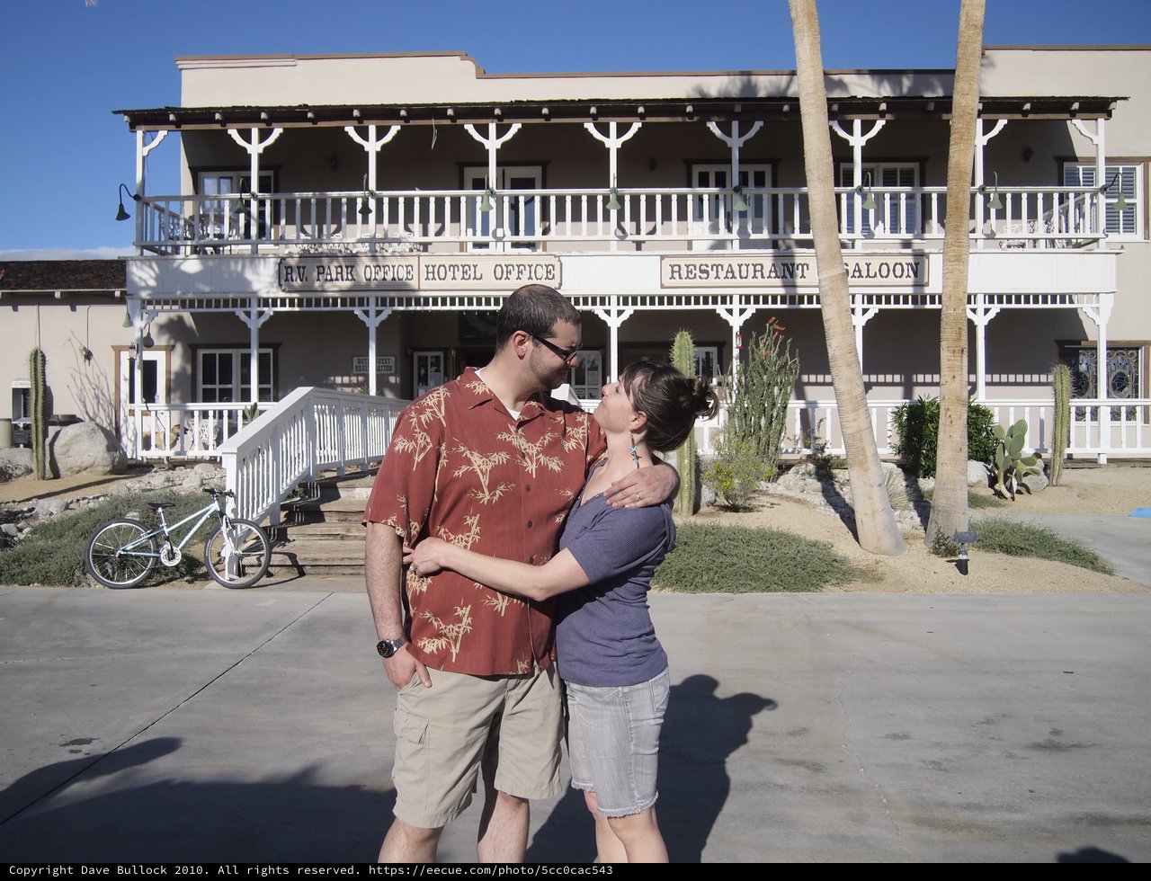 Couple's Romantic Moment at Desert Hotel Saloon