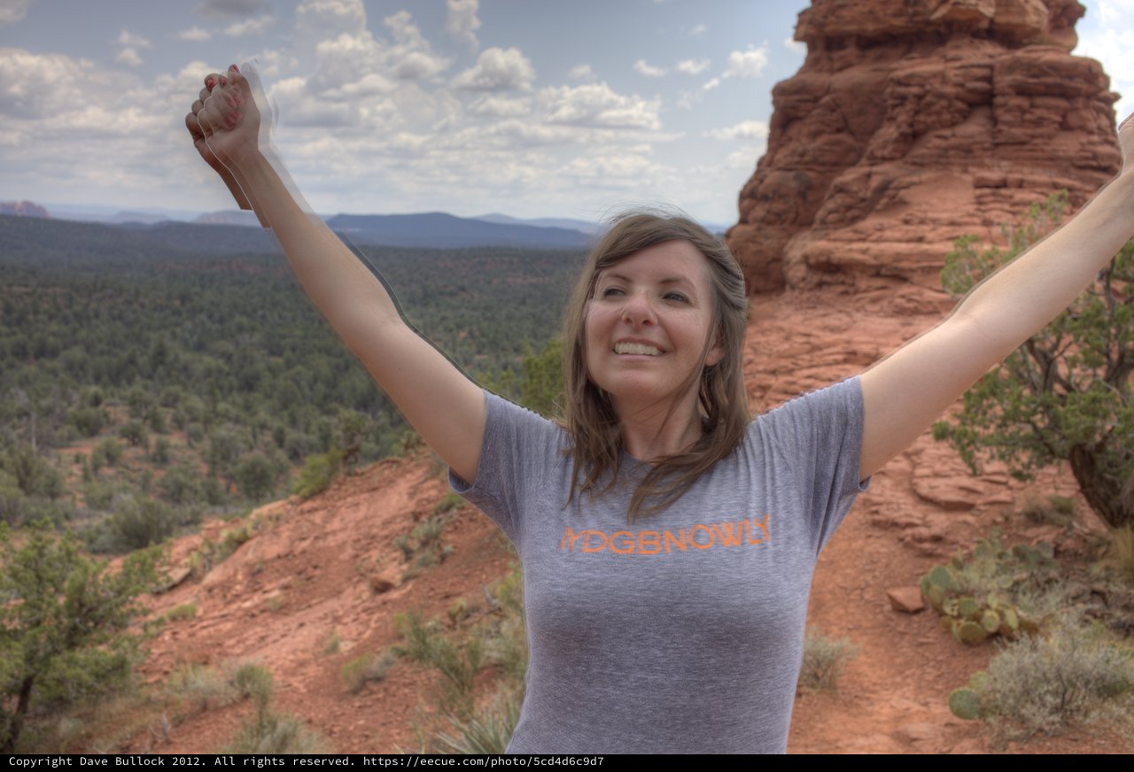 Triumphant Hiker Celebrates Atop Sedona Red Rocks