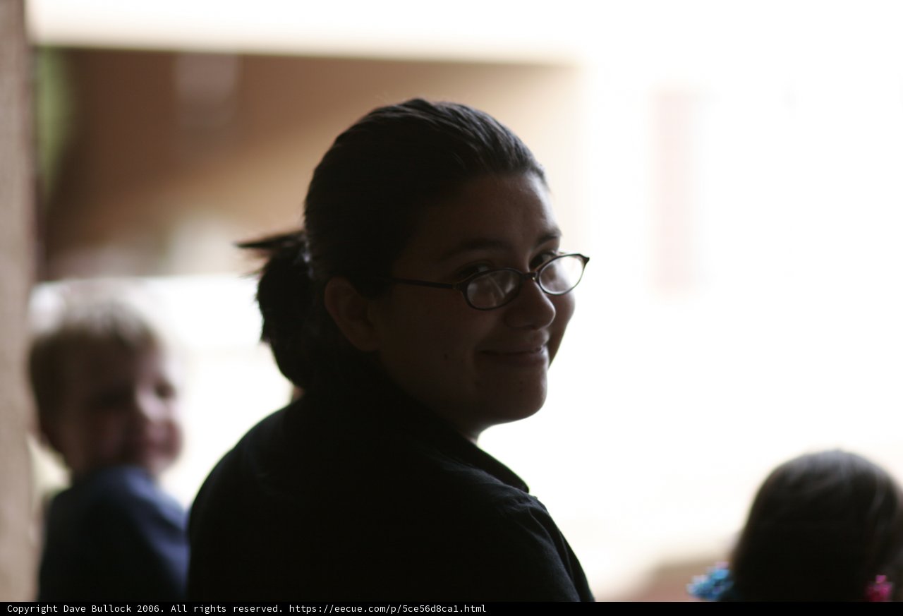 A Woman and a Child in Glasses