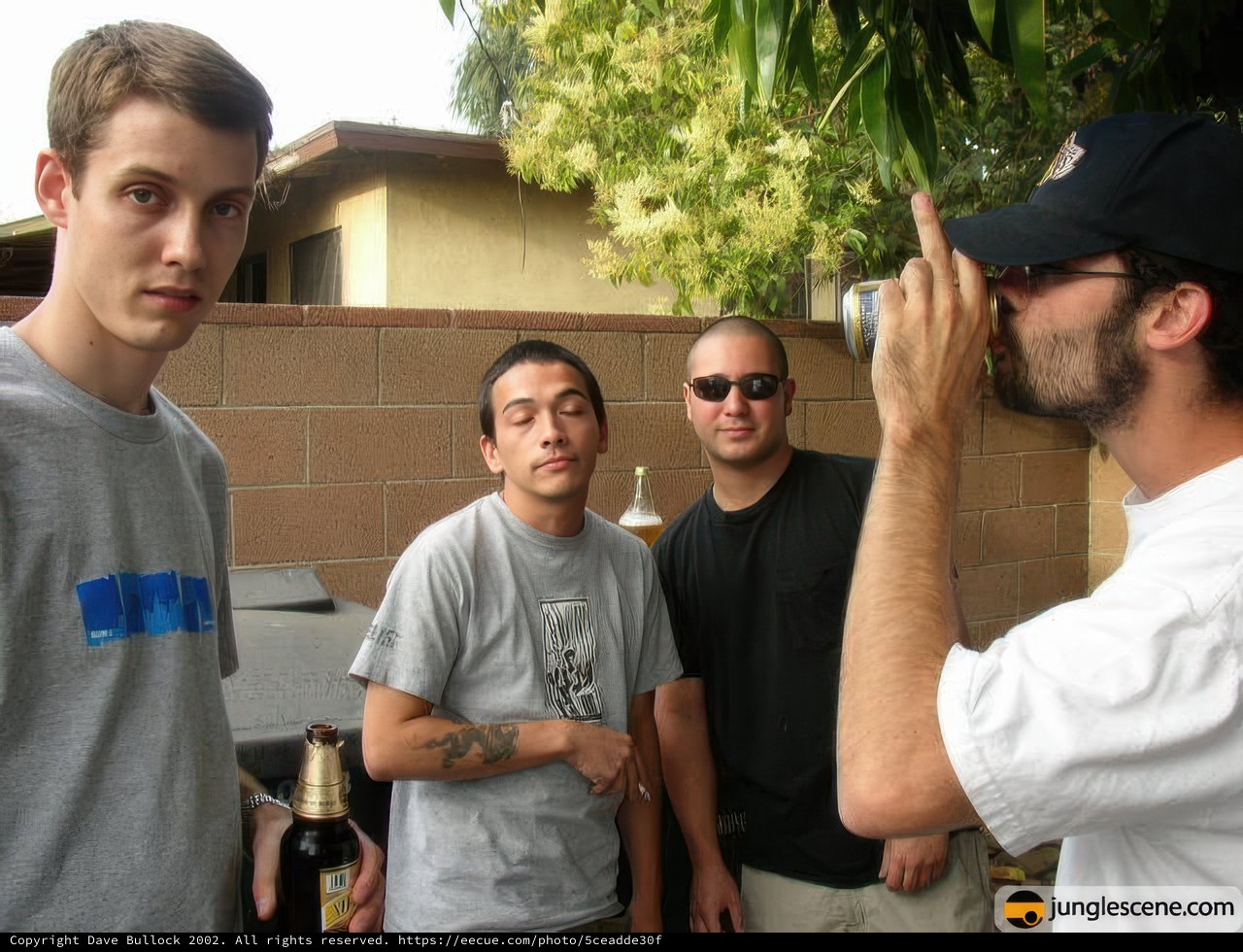 Group Portrait with Beer and Cameras