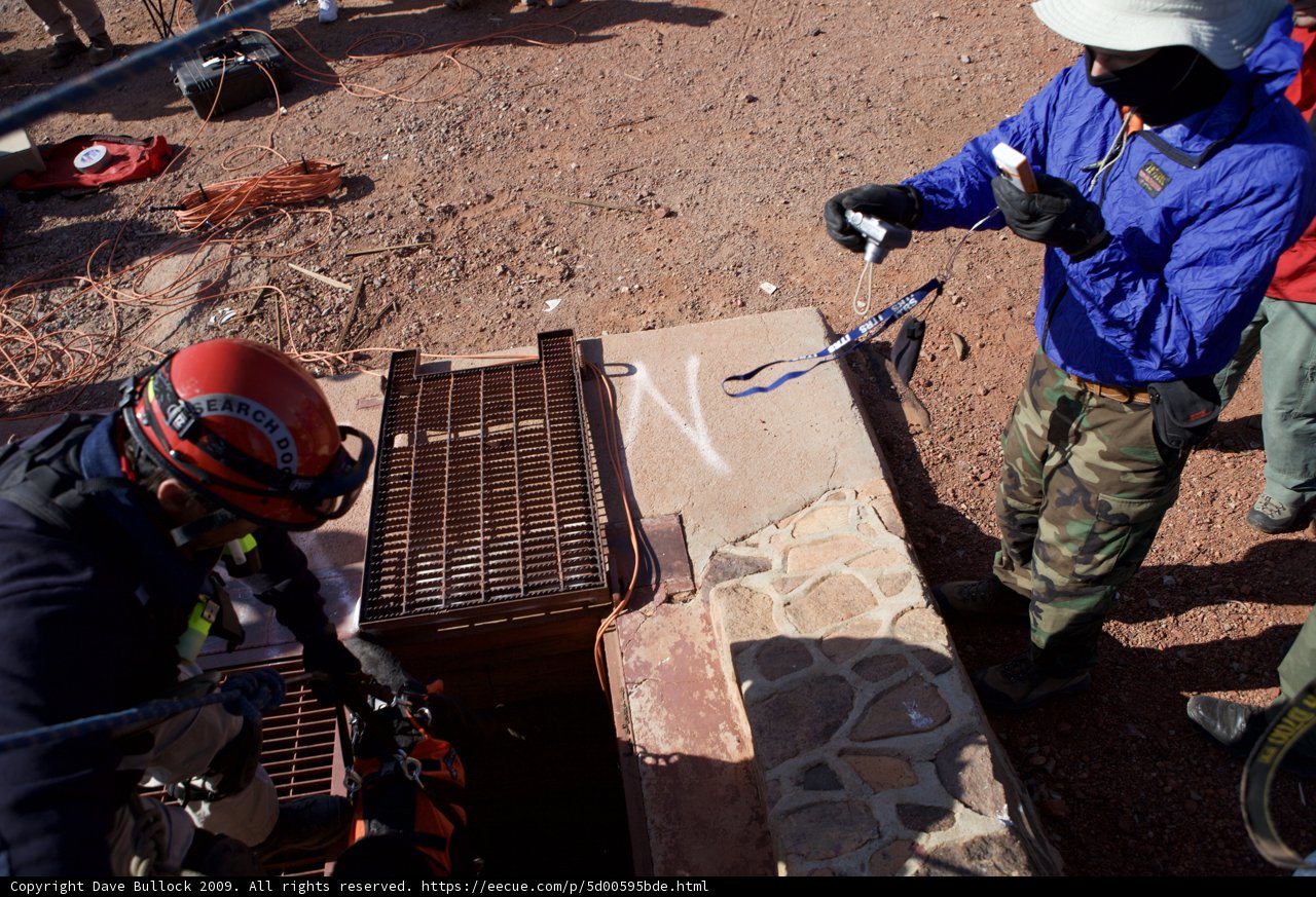 Helmeted Worker Emerges from the Mine