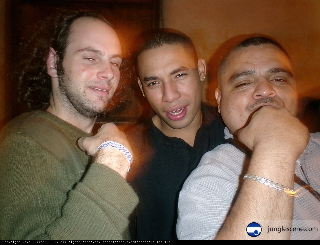 Three Men Strike a Pose