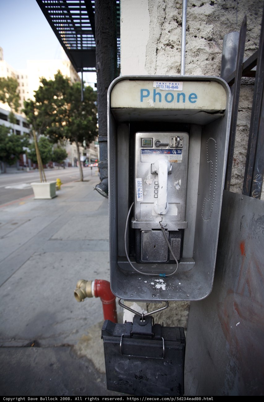 A Blast from the Past: Payphone on the Sidewalk