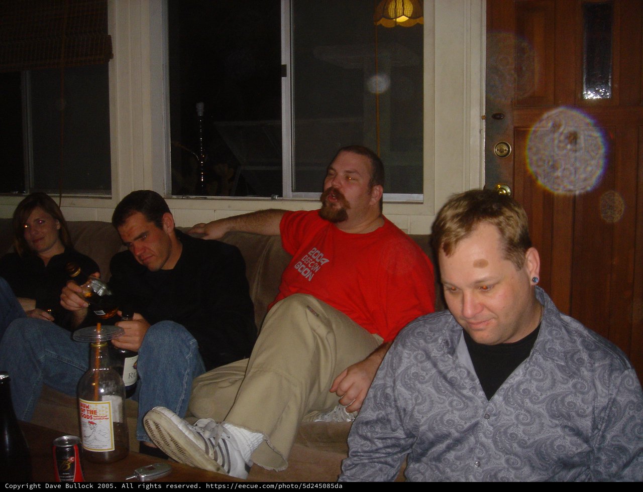 Friends Relaxing at a Casual House Party Night