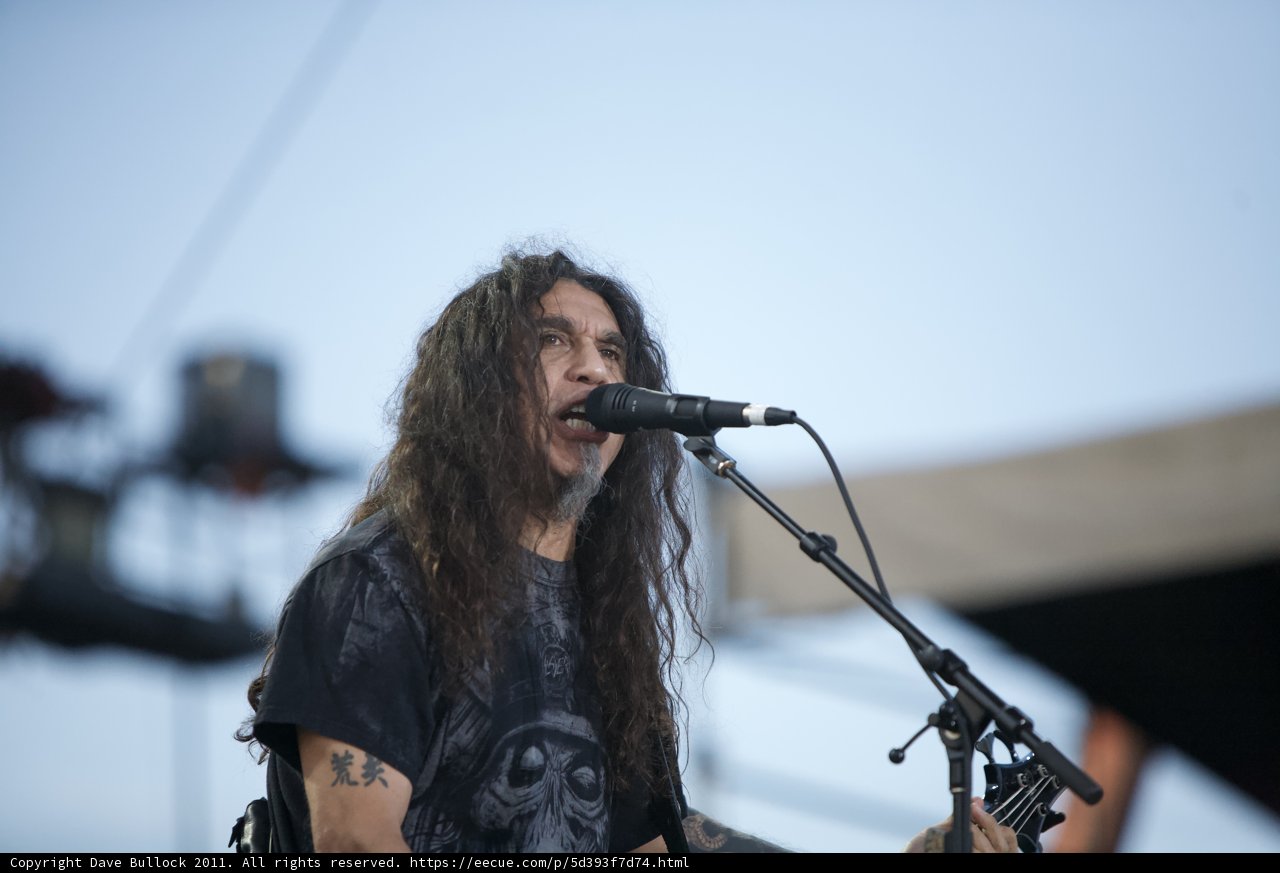 Tom Araya rockin' the stage with his guitar