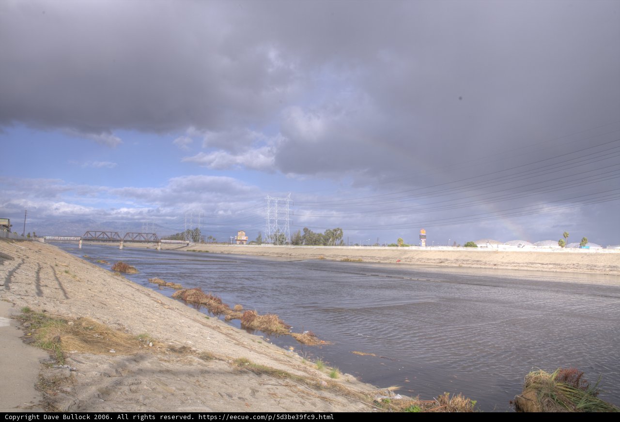 A Vibrant Rainbow Over Calm Waters