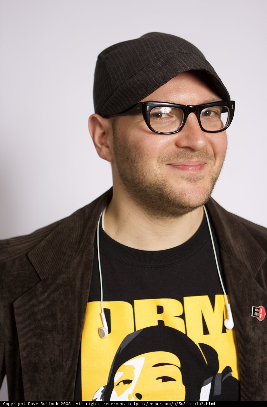 Smiling Man in Glasses and Beanie