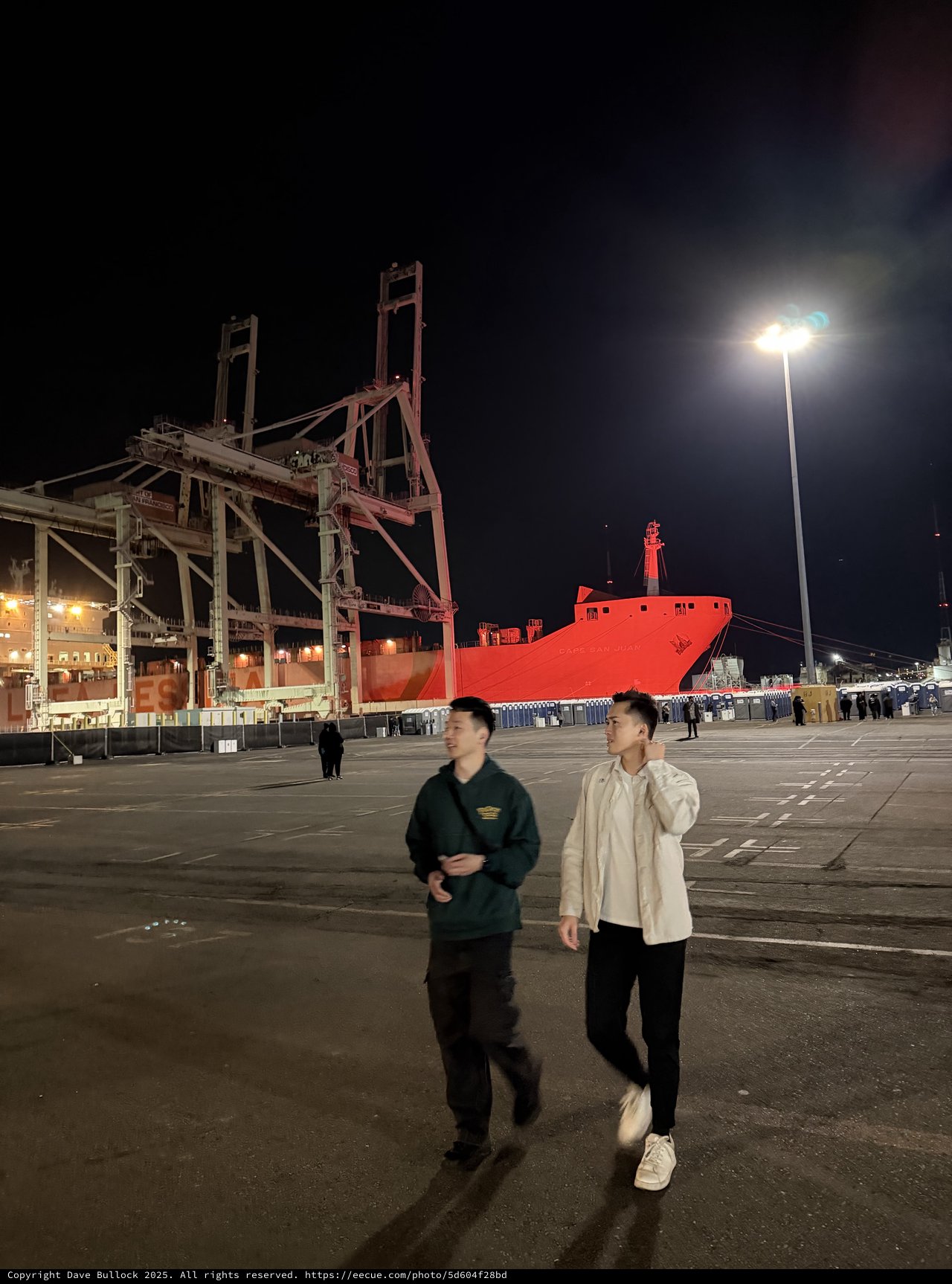 Night at the Industrial Port with Red Ship