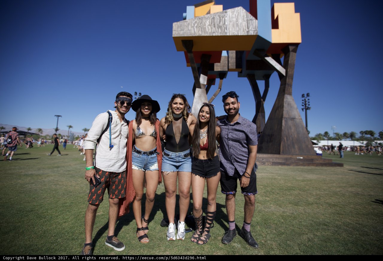 Posing in Front of Sculpture