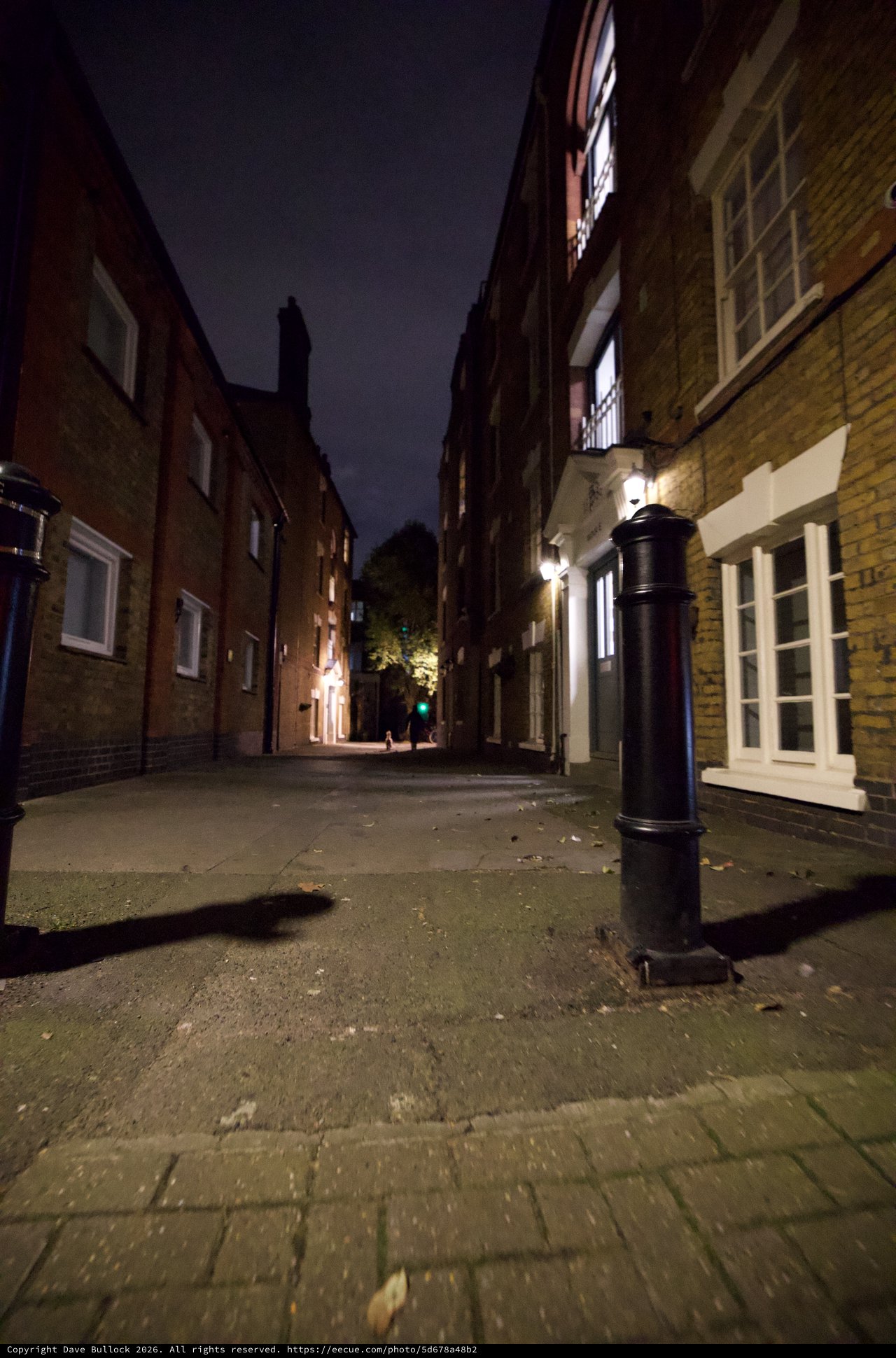 Narrow Cobblestone Alley at Night in London
