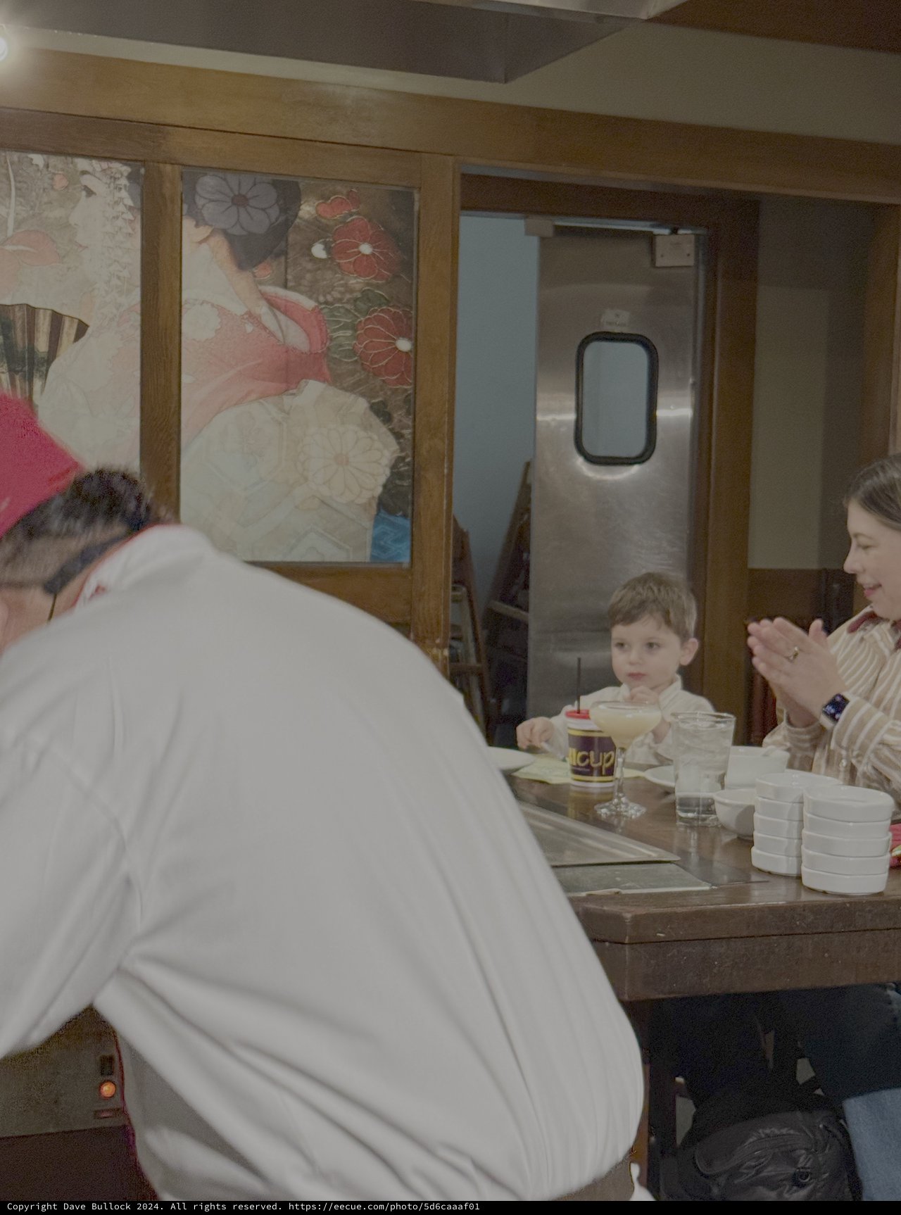 Family Dining in Japanese Restaurant Interior