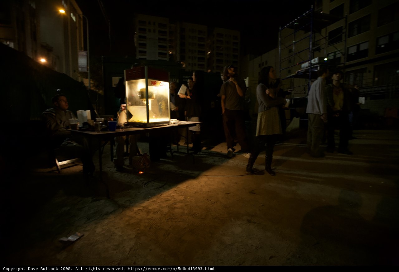 Nighttime Gathering around a Lively Restaurant Table