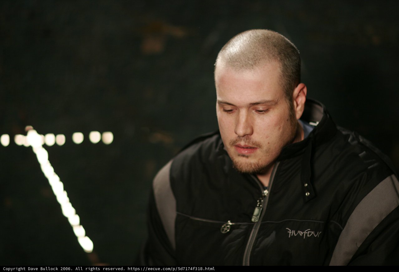 Shaved Head and Black Jacket